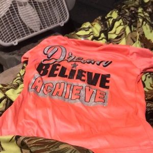 It says dream believe achieve